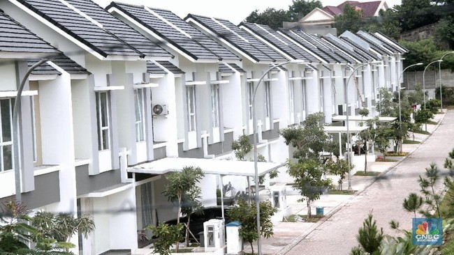 Ilustrasi rupiah melemah dan dampak terhadap harga rumah di Indonesia tahun 2026