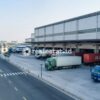 Ilustrasi area gudang logistik modern di kawasan industri Greater Jakarta
